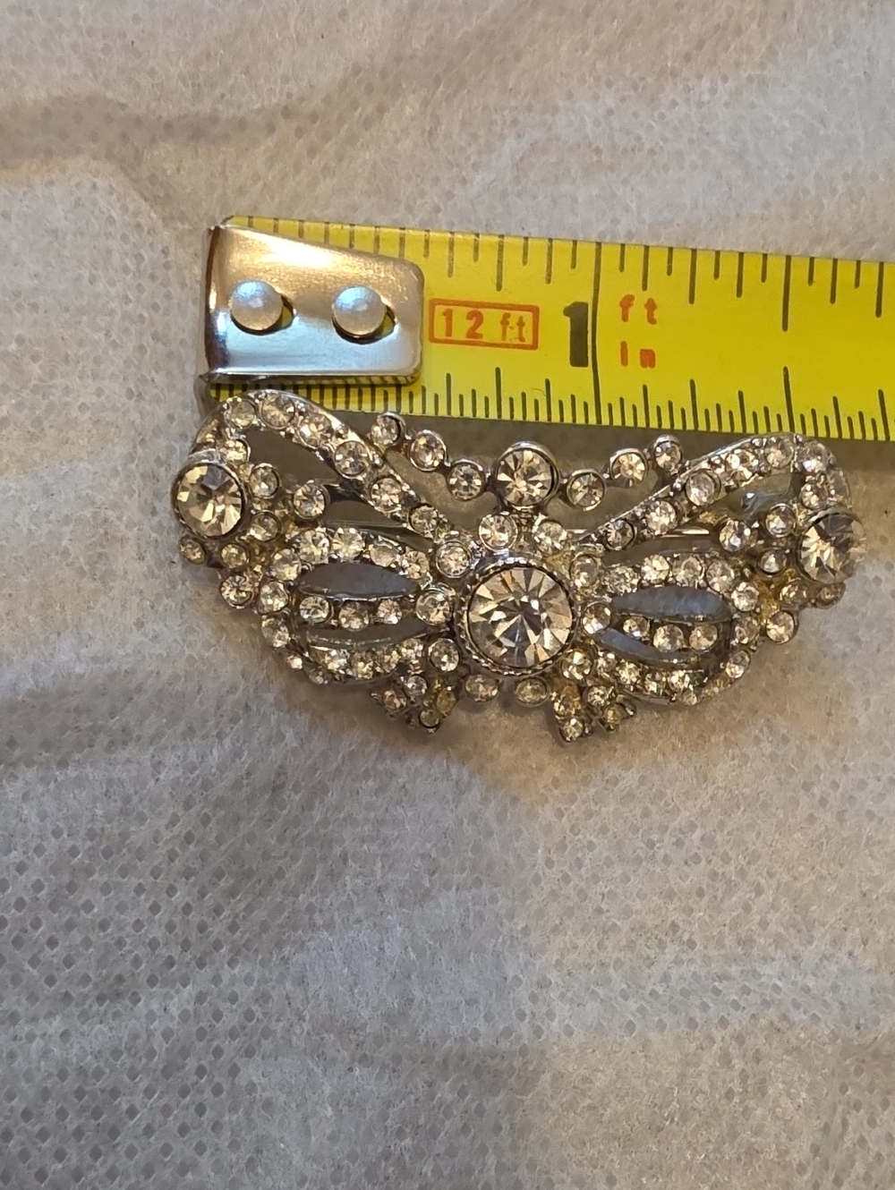 VIntage, silver-tone crystal rhinestone brooch with an ornate bow or wing-like f - Picture 4 of 5